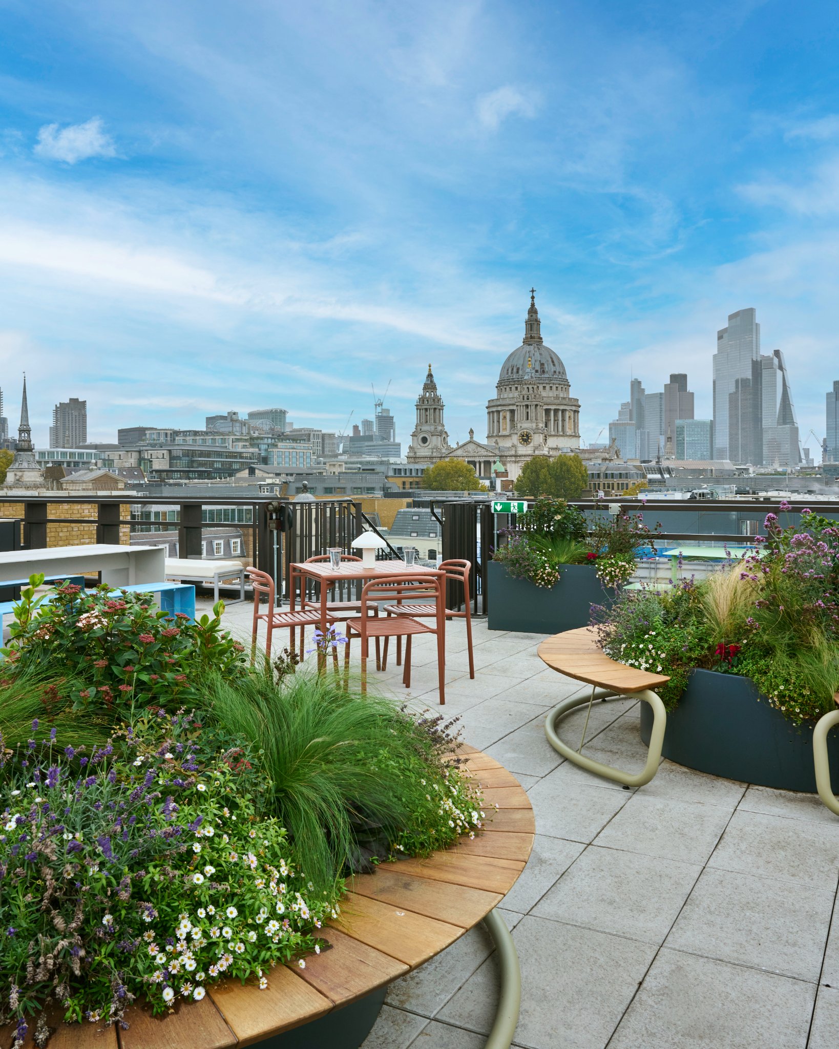 Landscaped rooftop terrace at Beaumont Blackfriars offering outdoor seating, city views and space for informal meetings.