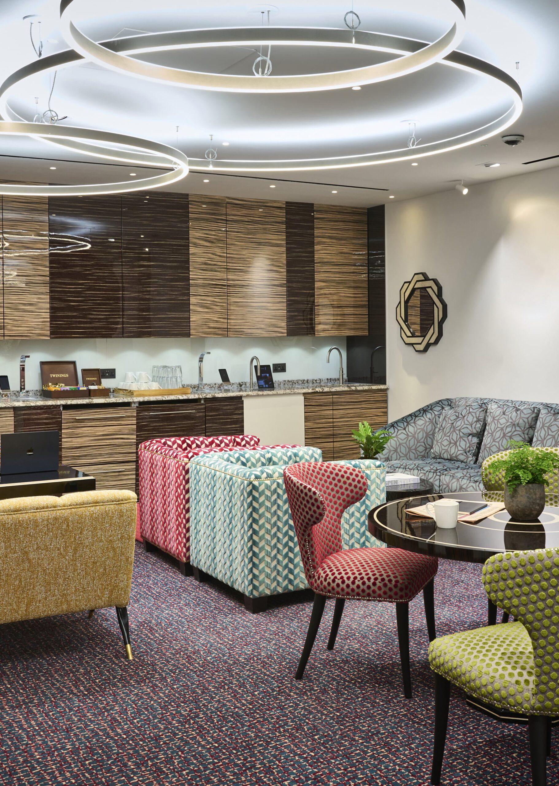 Welcoming business lounge at Beaumont Green Park offering breakout spaces, informal meeting areas, and complimentary refreshments.