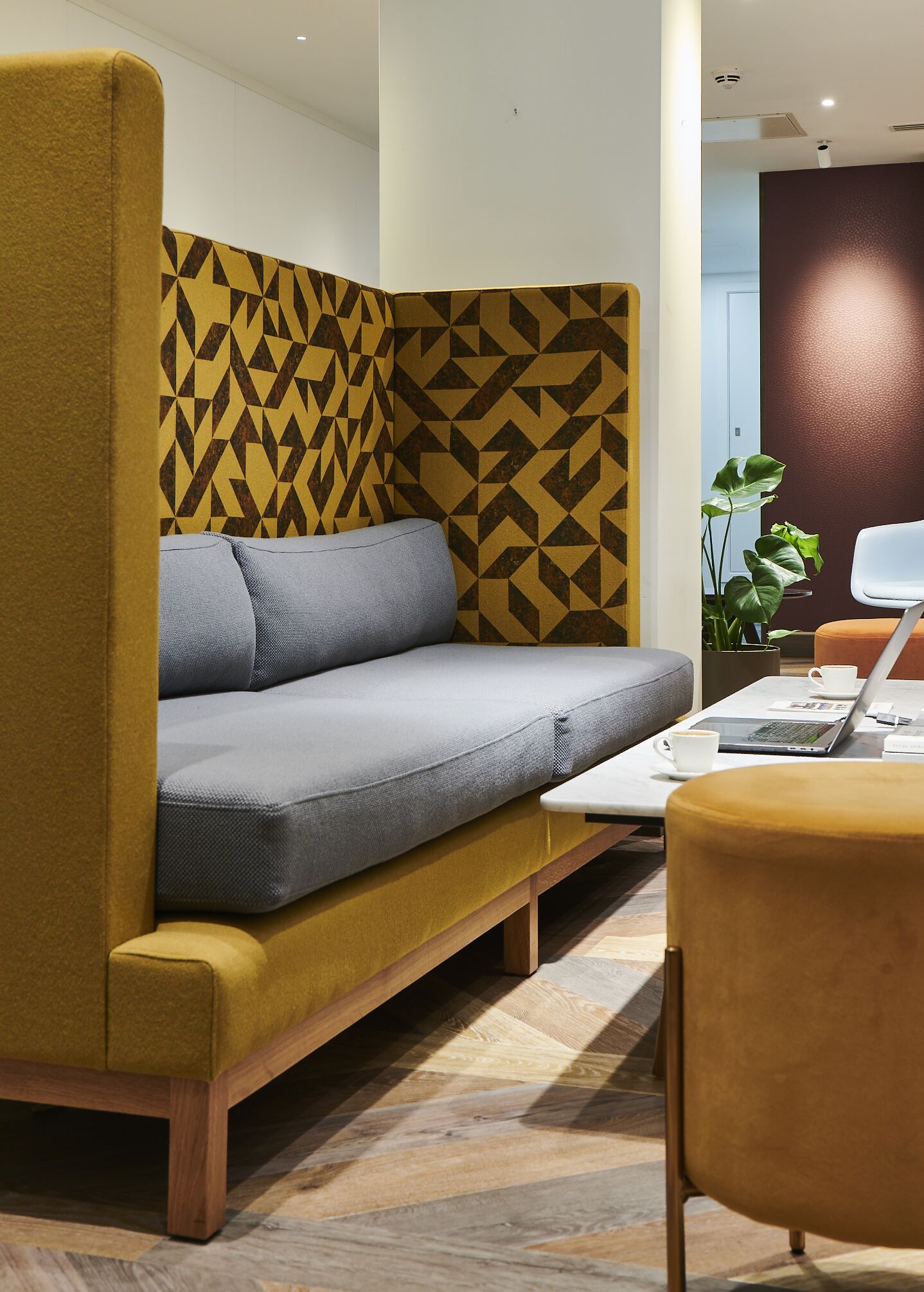 Contemporary lounge seating area designed for informal meetings, networking and relaxation within Beaumont Midtown.