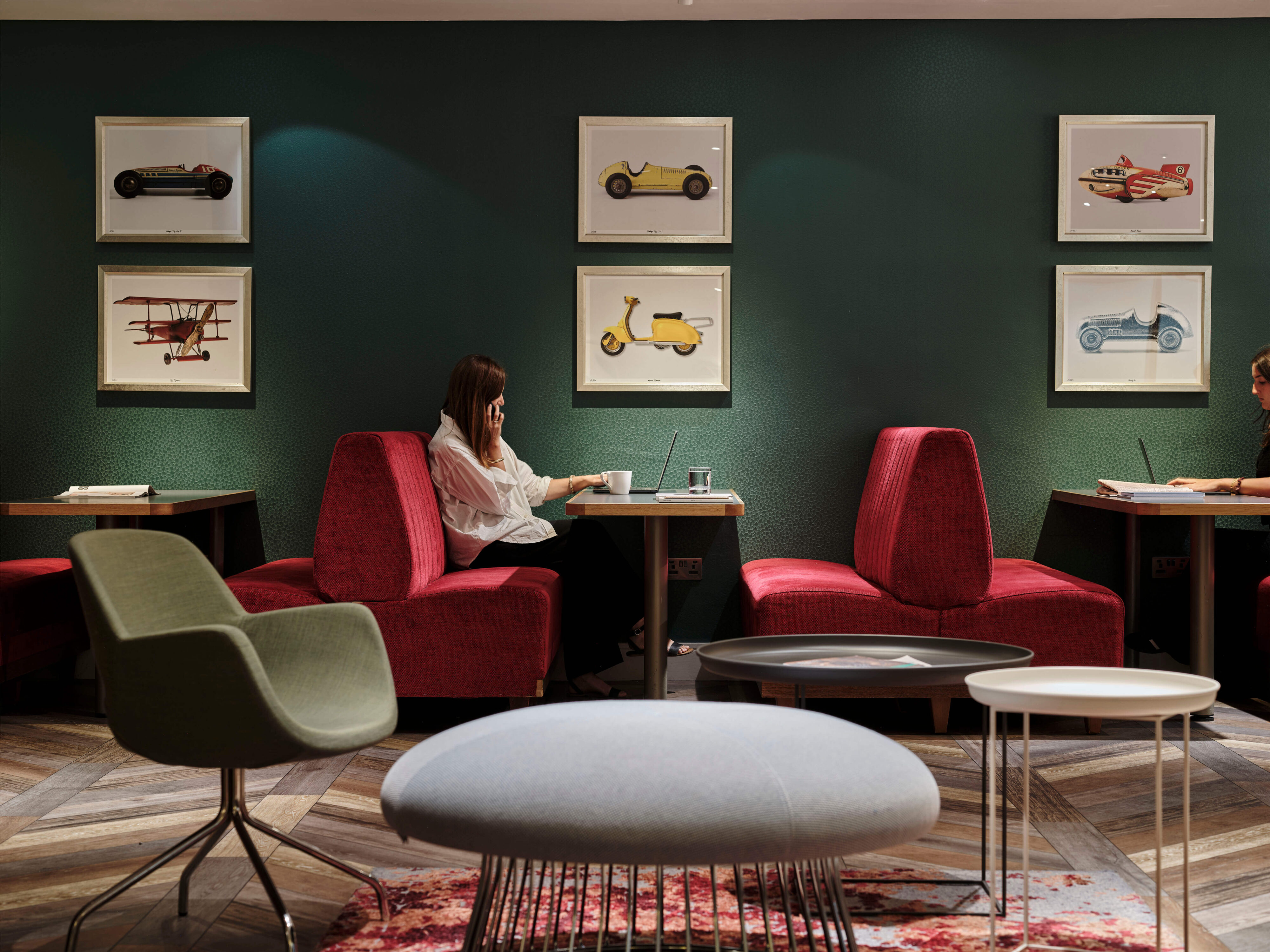Informal lounge area with client working at Beaumont Mayfair